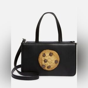 Puppets and Puppets Small Cookie
Top Handle Bag new without dust bag